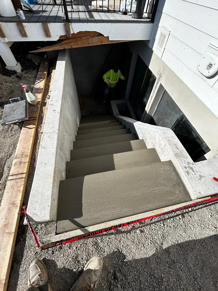 Concrete stairwell viewed from the upper landing